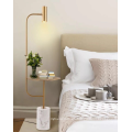 Lámparas de pie doradas de diseño moderno y único para iluminación de salas de estar y hoteles.